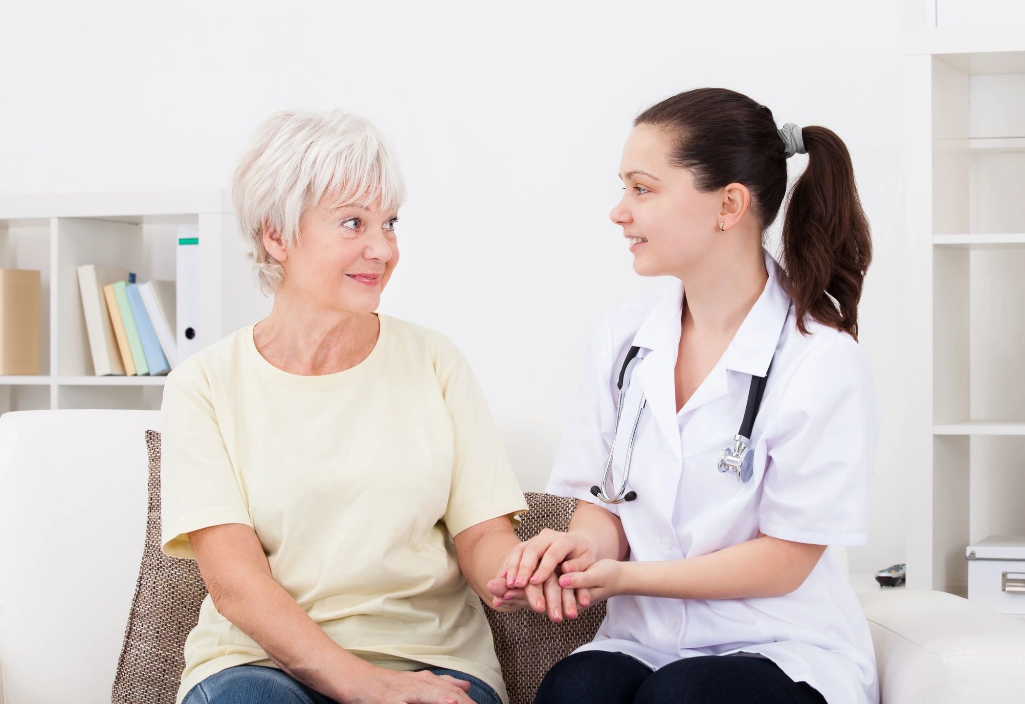 Elderly lady with nurse